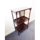 A good late 19th/early 20th century mahogany bookstand in 18th century-style; the flame-mahogany top