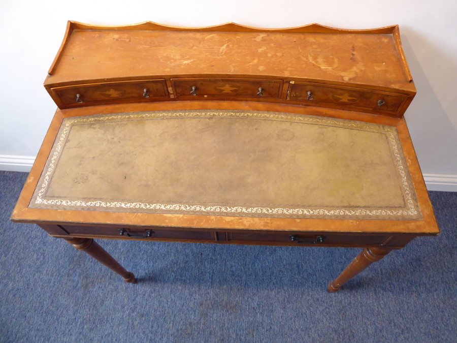 A reproduction yew-wood writing desk; the galleried superstructure with three concave drawers headed - Image 3 of 7