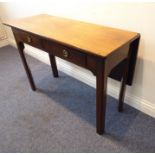 An 18th century mahogany side/centre table; the rear leaf opening on a gateleg action, the front