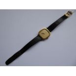 A lady's Omega De Ville gold-plate-cased dress wristwatch; the gold-coloured dial signed and with
