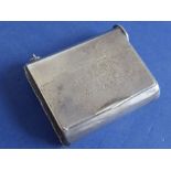 An unusual and heavy hallmarked silver vesta case; the flush-hinged lid engraved W.T. LEGGE. 3RD