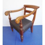 A late Regency period mahogany open-armed child's chair on turned front legs