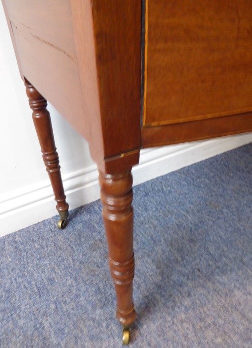 An early 19th century bow-fronted mahogany sideboard of small proportions; the central drawer - Image 6 of 6
