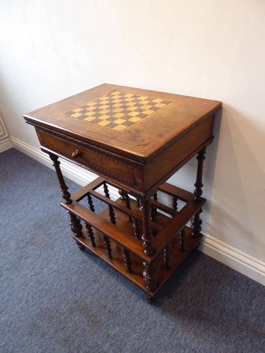 A circa 1900 walnut and mahogany games/card table with Canterbury lower section; the inlaid