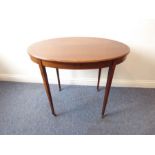 An Edwardian oval mahogany and satinwood crossbanded occasional table raised on square tapering