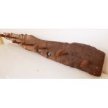 A rustic eight-peg coat hook, possibly oak or elm (121cm wide)