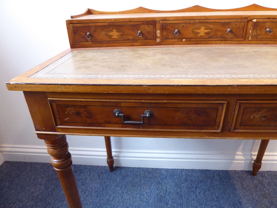 A reproduction yew-wood writing desk; the galleried superstructure with three concave drawers headed - Image 7 of 7
