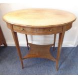 An Edwardian period oval occasional table; mahogany with satinwood crossbanding, single bow-