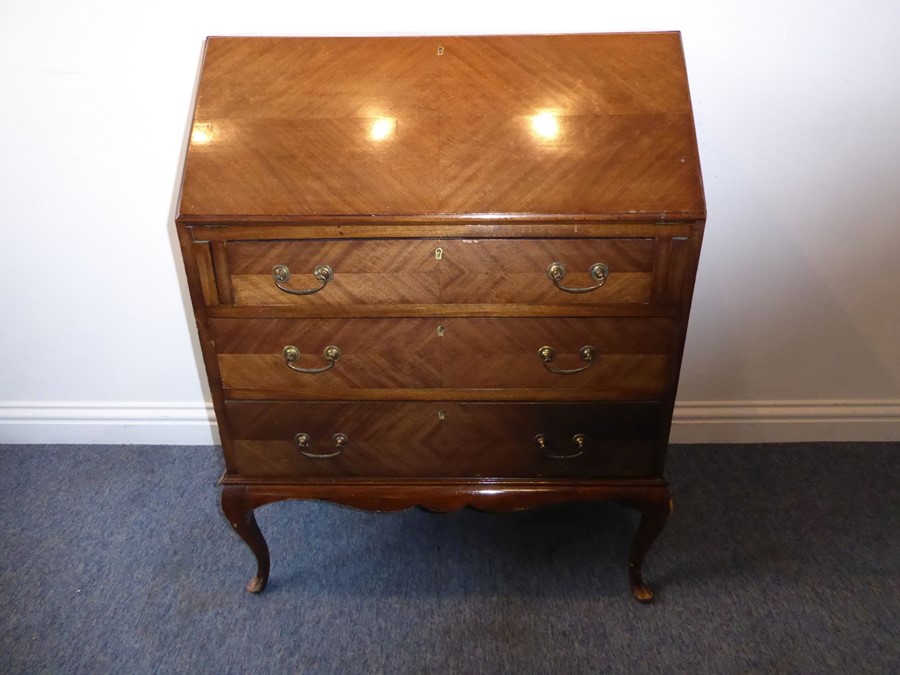 An early 20th century walnut writing bureau; the quarter-veneered sloping fall opening to reveal - Image 4 of 7
