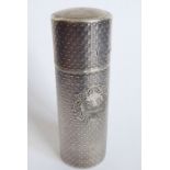 An unusual hallmarked silver gentleman's travelling shaving brush; the lid pulling off and the brush