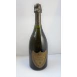 A bottle of 1980 vintage Dom Perignon champagne (ullage 1cm below foil) ESTIMATE CHANGED FROM