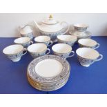 A good Royal Doulton part tea service in the Baronet pattern (H.4999); comprising cups, saucers,