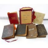 An interesting selection of seven miniature books to include a leather-bound 'History of the New and