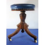 A late 19th century Aesthetic-style circular adjustable walnut piano/music stool; applied maker's