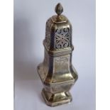 A hallmarked silver squared baluster-shaped caster; assayed London 1936 (18.5cm to tip of finial,