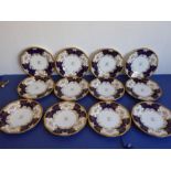 A set of 12 early 20th century fine Coalport porcelain dessert plates; each with raised beaded