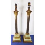 A pair of gilt-metal and green-onyx mounted table lamps modelled as Corinthian columns, probably