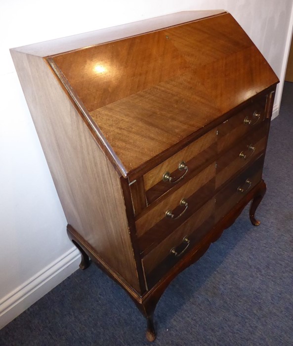 An early 20th century walnut writing bureau; the quarter-veneered sloping fall opening to reveal - Image 5 of 7