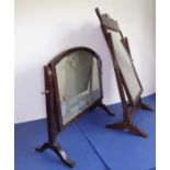 A Georgian-style mahogany-framed toilet mirror having shaped pediment together with one other