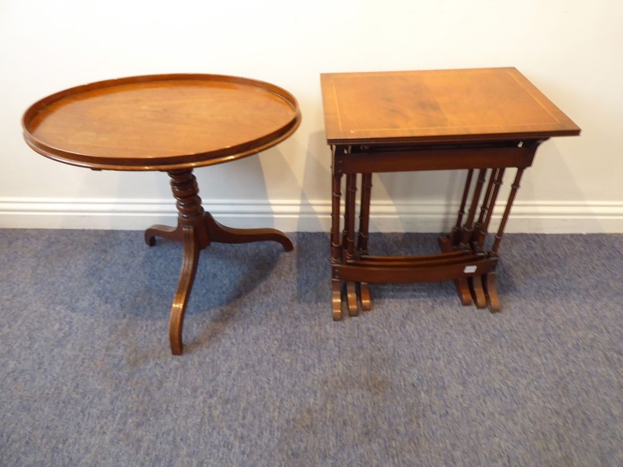 A George III style (probably 19th century) oval tilt-top mahogany occasional table, bobbin-turned