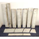 Various elements of two white Carrara marble fireplaces (two pieces broken and seven intact)