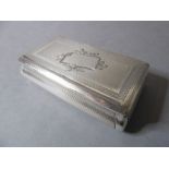 A 19th century silver snuff box, French duty marks to lid (The cost of UK postage via Royal Mail