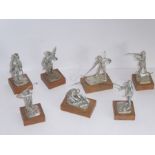 An unusual limited edition (240/1000) solid silver (mounted on hardwood bases) models of various