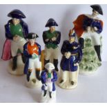 Six varying sized hand-decorated Staffordshire figure models of Napoleon (the tallest (with hole