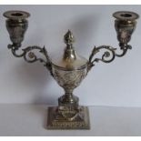 A 19th century silver plated two-light candelabra in high Neo-Classical style; the central lidded