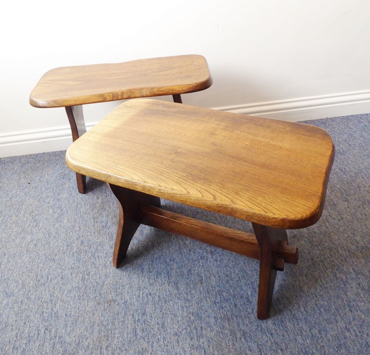 Two shaped elm-topped occasional tables; each with shaped uprights and tusked tenons