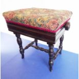 A late Victorian piano stool with upholstered top and raising mechanism
