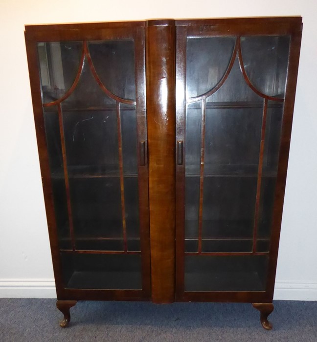 A 1920s/1930s two-door walnut display cabinet; pagoda-style astragal glazing bars and raised on - Image 2 of 7