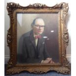 J W YOUNG; a  half-length portrait on canvas of a gentleman with red bowtie and striped three-