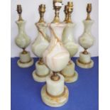 A set of seven baluster-shaped green and brown onyx table lamps (approx 42cm high incl. fittings)