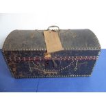 A good 19th century dome-topped leather and studded trunk bearing the internal paper label of 'J