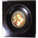 A framed portrait miniature of Friedrich Schiller as a young man