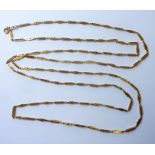A heavy fancy link long chain necklace of alternating rectangular and double pear-shaped openwork