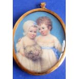 An oval portrait miniature, colour print study of two children, gilt-frame (7cm high) Condition