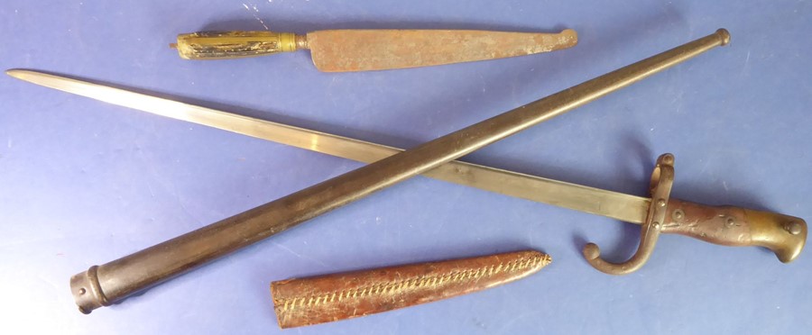 A French Model 1874 Gras bayonet and a North African dagger; the bayonet with Chatellerault