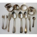 Assorted silverware to include five hallmarked circular silver napkin rings, teaspoons and a salt