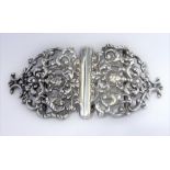 An ornate silver buckle, hallmarked London 1899