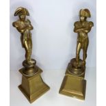 A pair of heavy solid brass 20th century models of Napoleon standing with crossed arms upon a