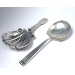 Two silver caddy spoons; one of shell form and with .925 Birmingham assay mark, the other