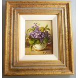 Florian GRASS; a still life oil on panel study of violets in a vase, signed lower right, 2009 S.& V.