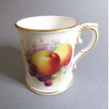 An early 20th century Royal Worcester miniature porcelain tankard; hand decorated with various