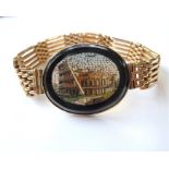 A micro mosaic and 9-carat yellow-gold gate-link bracelet, the oval micro mosaic plaque depicting