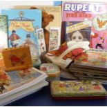 A collection of Rupert Bear annuals and other Rupert Bear collectables