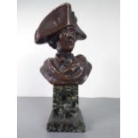 A late 19th / early 20th century patinated bronze shoulder-length bust of Napoleon wearing bicorn
