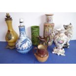 Ceramics to include vases, a fireside model of a seated cat and a 19th century Lambeth Doulton