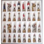 An Italian painted cast-metal chess set; Napoleonic War themed, with the Kings modelled as